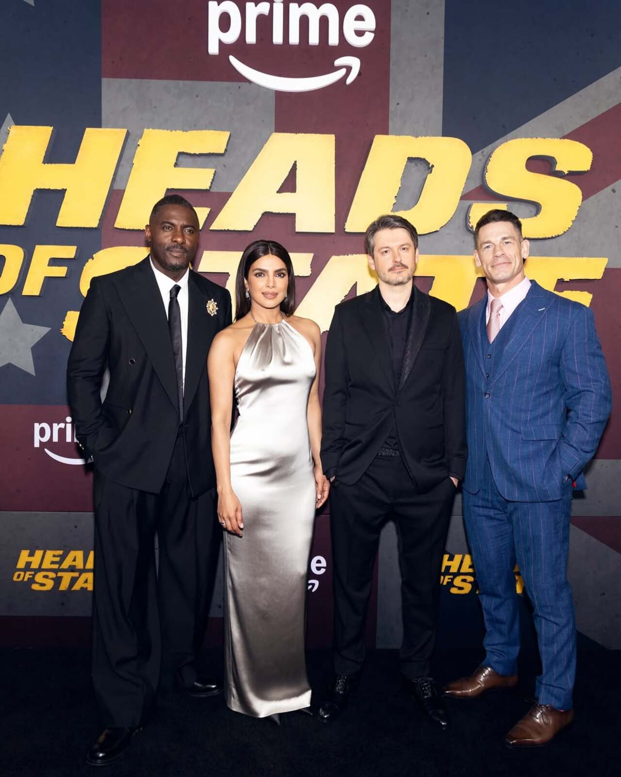 Priyanka Chopra effortlessly stood out as she posed with her co-stars John Cena and Idris Elba on the red carpet of the New York premiere of their film Heads of State